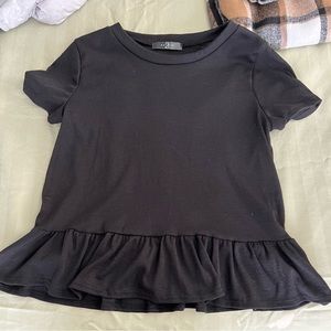 Black, small, flared bottom tee